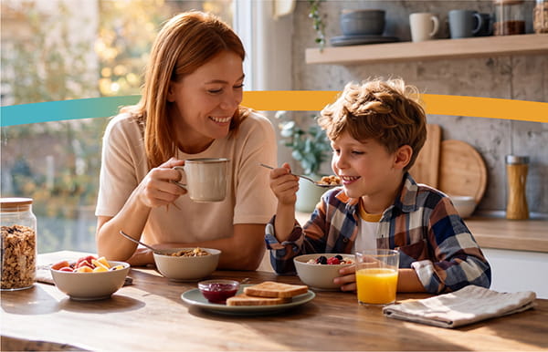Save on your next prescription - mother and son at breakfast